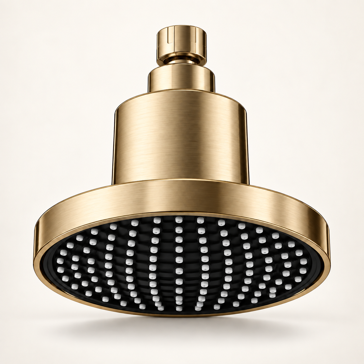 Brushed gold Velora filtered showerhead showing the accurate underside on a warm ivory background